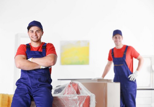 Professional team handling flat removals in Surrey with careful loading