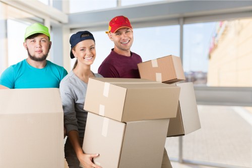 Professional house removals in Surrey with packed moving boxes