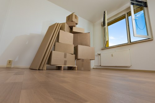 Packed boxes and furniture prepared for storage during a move
